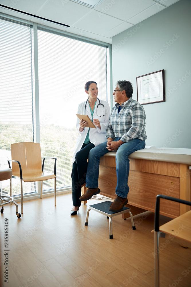 Doctor and patient having a conversation in a nice office room
