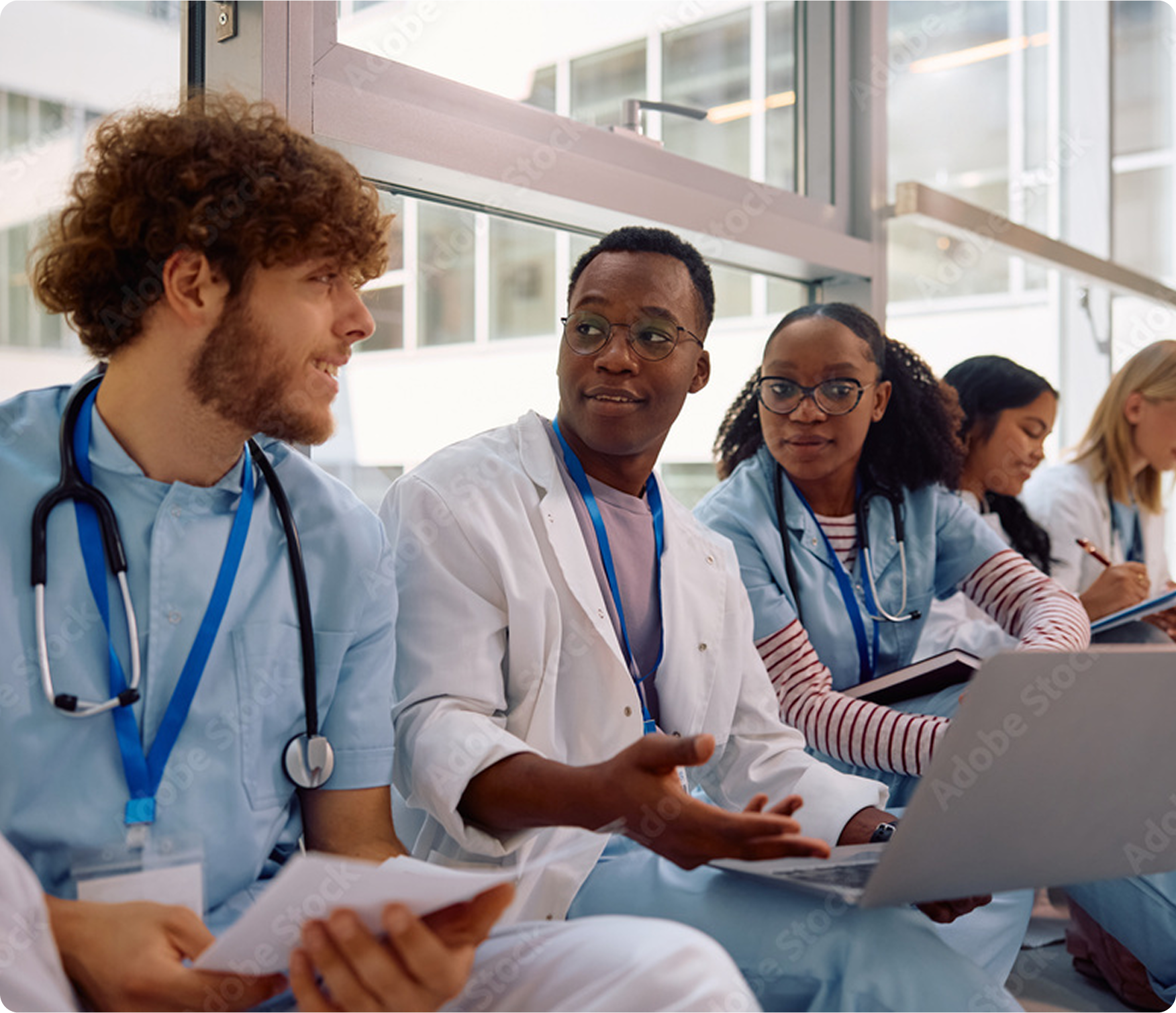 Doctors talking to one another