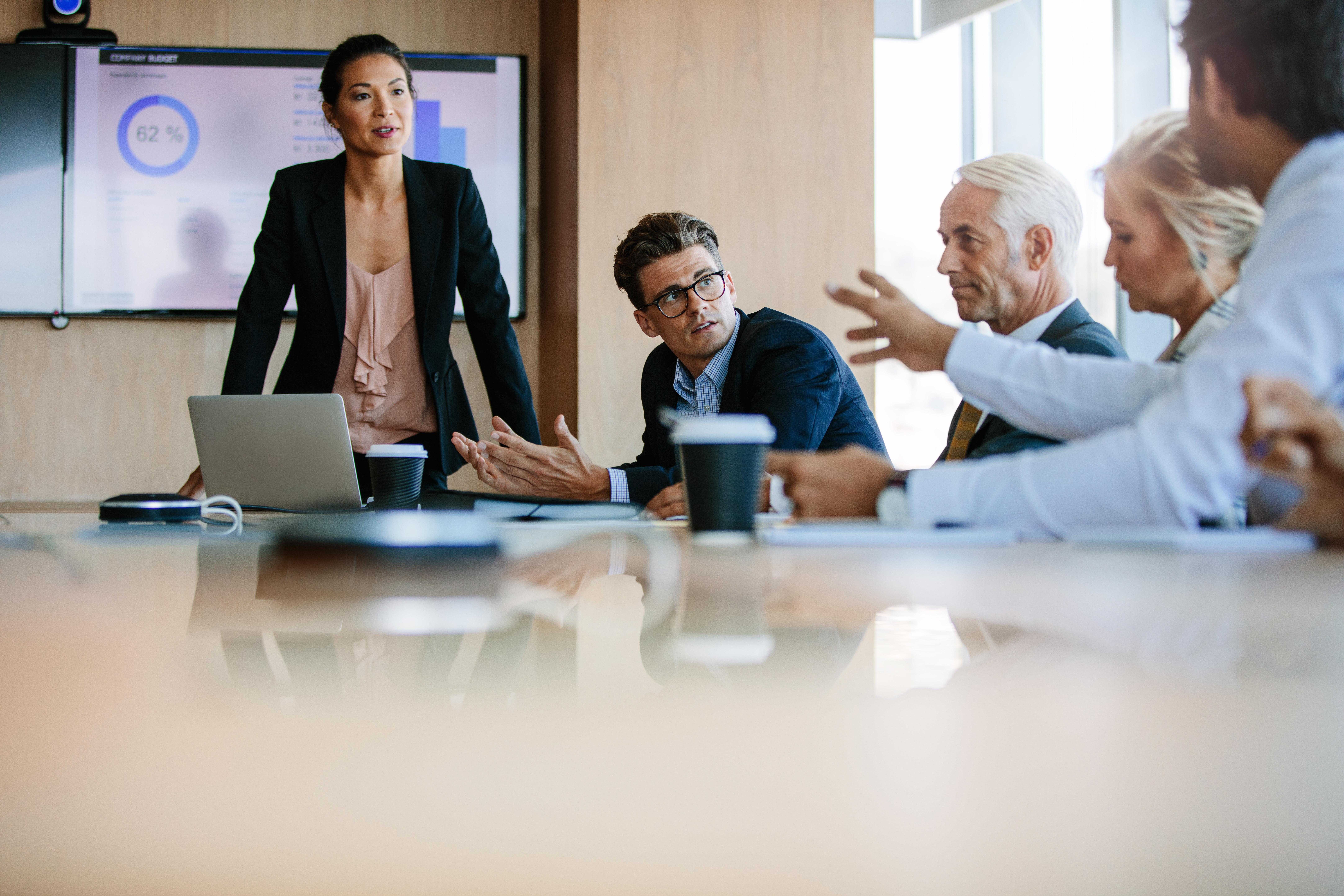 A business woman leading a meeting