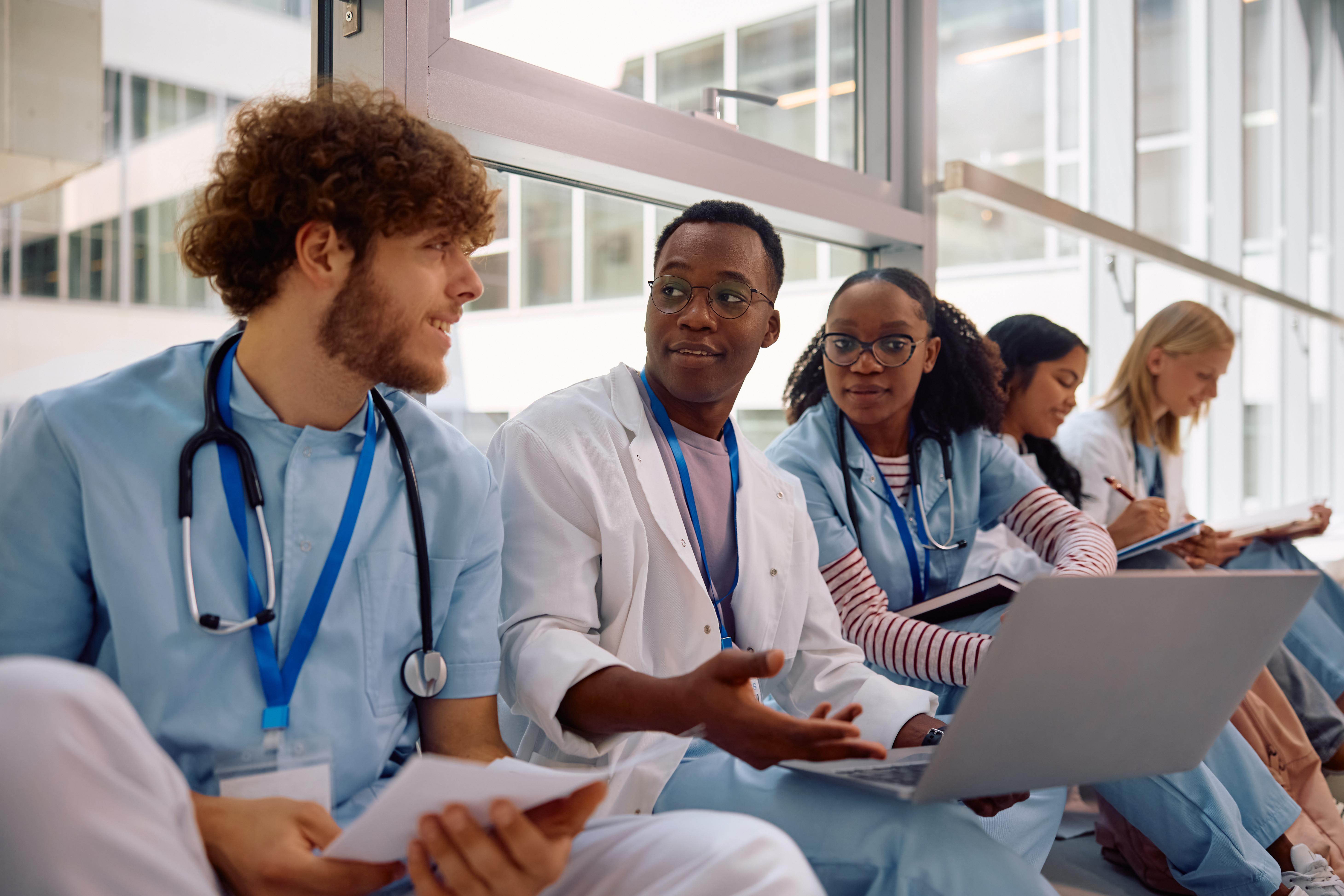 Doctors talking to one another